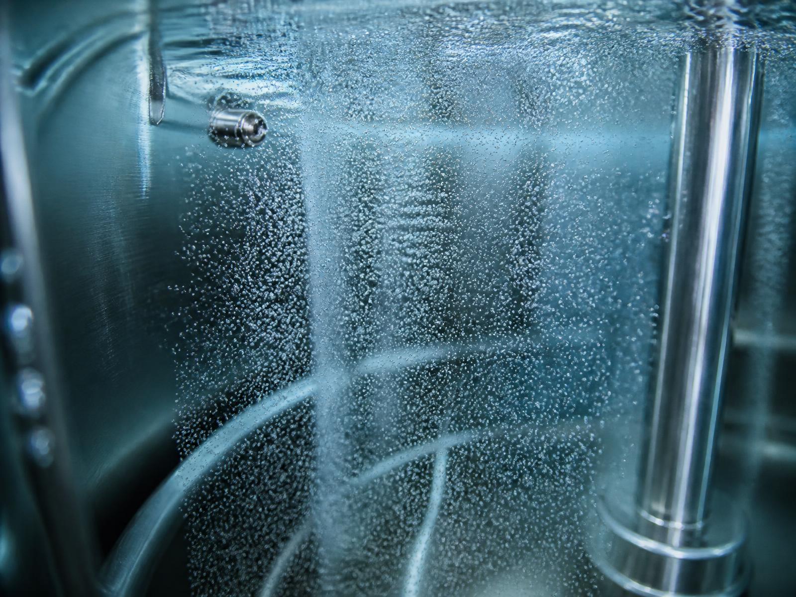 Water with dense nanobubbles in a treatment tank